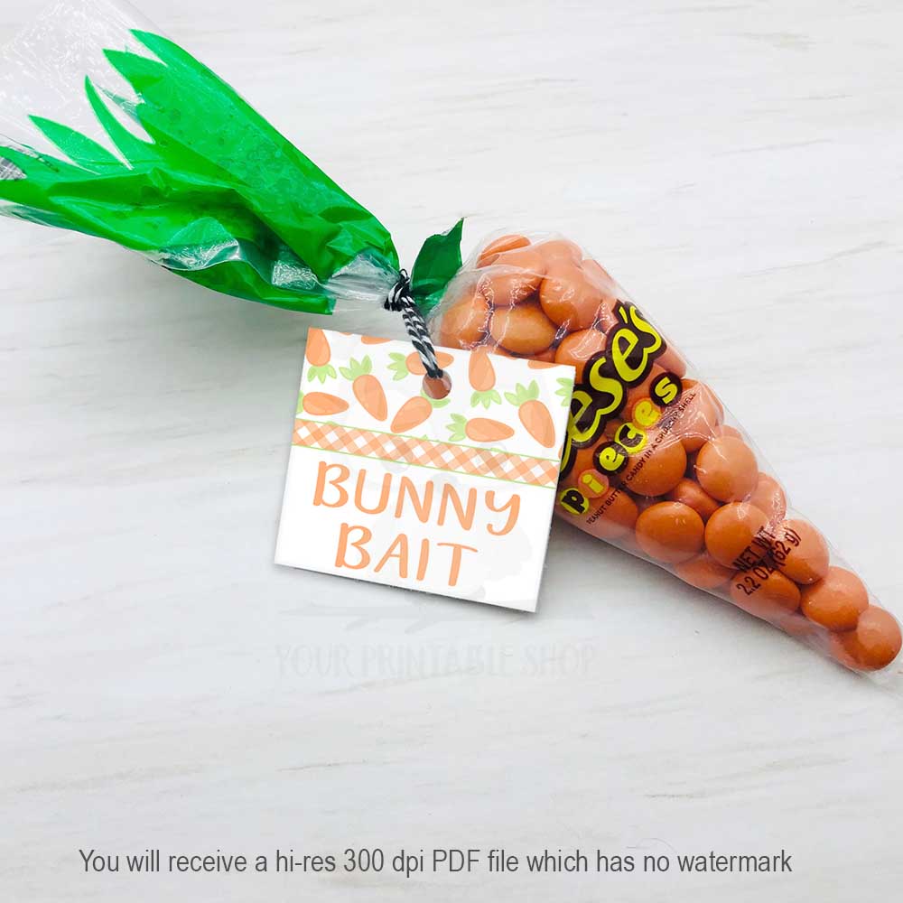 Easter Bunny Bait Gift Tags attached to small clear treat bags filled with colorful candies, cookies, and carrots. A fun and festive Easter gift idea.