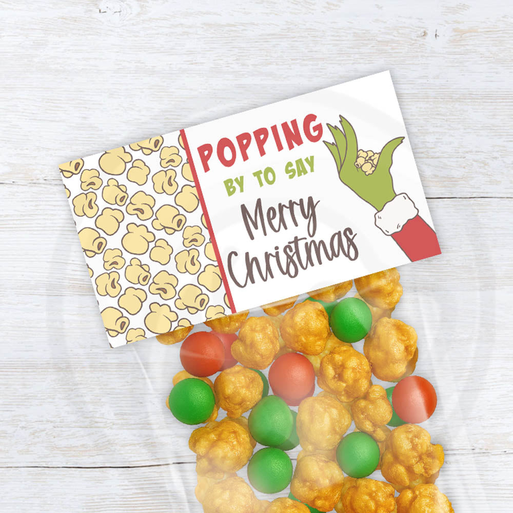 Printable Christmas holiday "Popping by to say Merry Christmas" popcorn treat bag topper. Two sizes included in download. Popcorn background with cute green hand and trendy fonts.