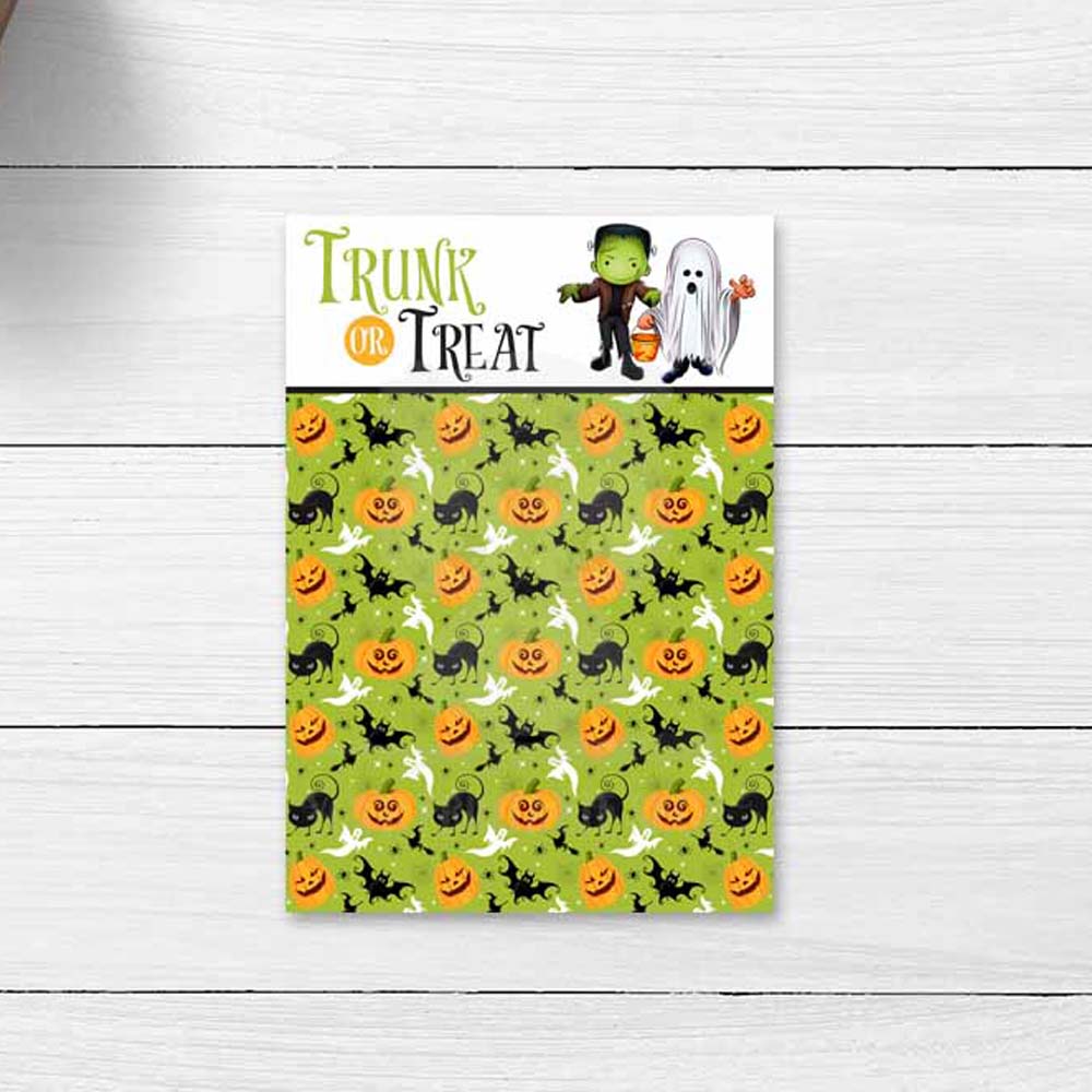 Printable 3.5x5 Trunk or Treat mini cookie card with a friendly monster, ghost, and lime green Halloween pattern featuring pumpkins, black cats, bats, and ghosts.