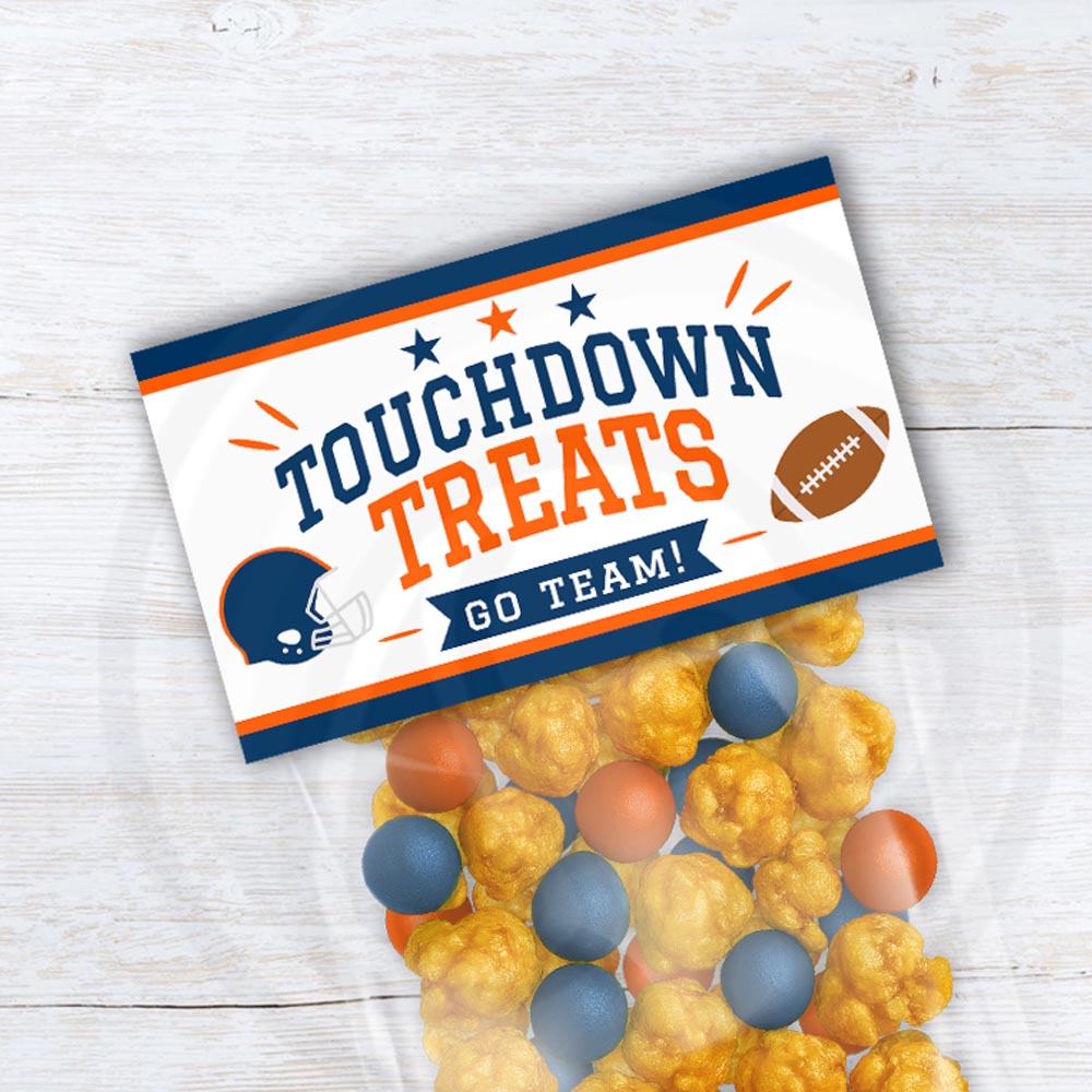 Printable Touchdown Treats football bag topper in navy blue and orange for team snacks, tailgate parties, homecoming and football parties.