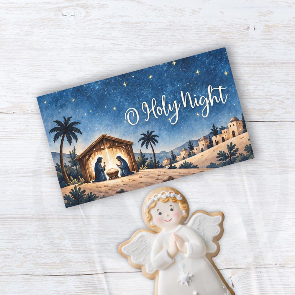 O Holy Night printable treat bag topper featuring baby Jesus in a nativity scene beneath a starry blue sky for Christian Christmas cookie and candy gifts.