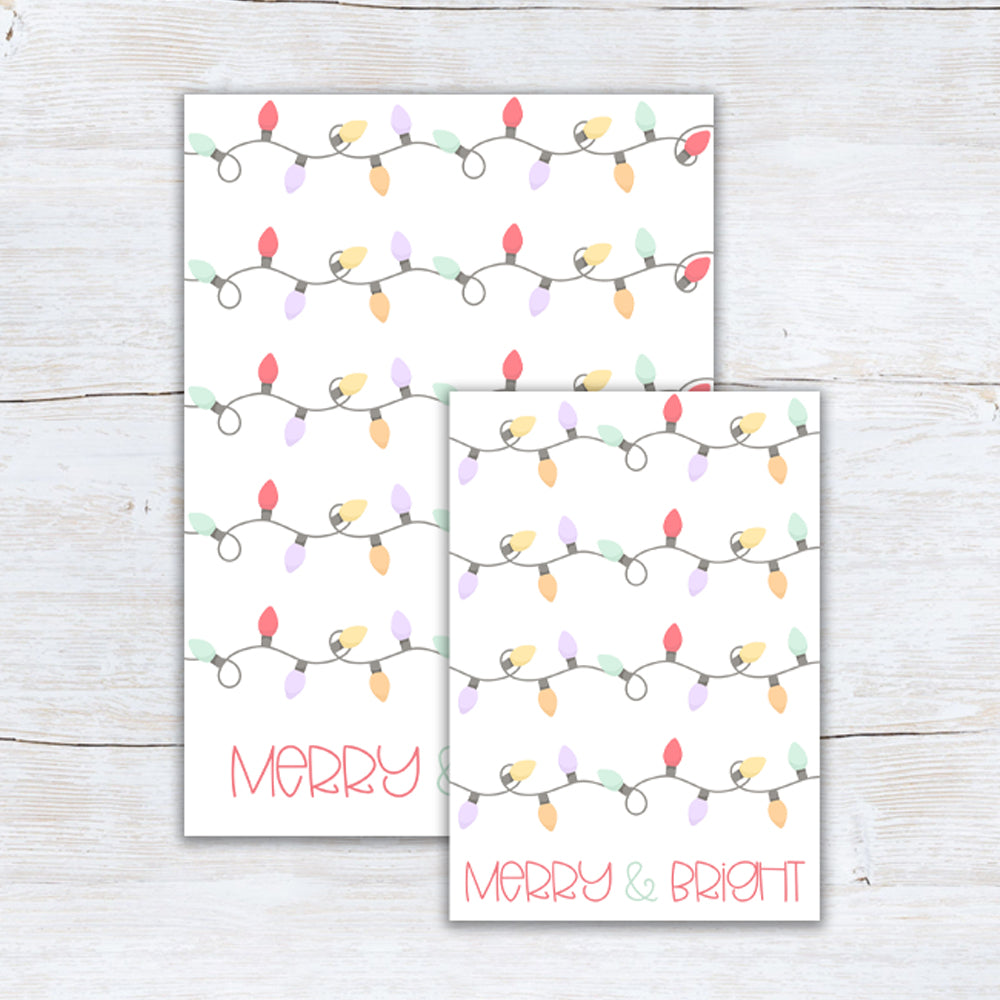 Printable Christmas cookie cards with pastel pink, mint, lavender, yellow, and peach string lights on a white background and “Merry & Bright” text.