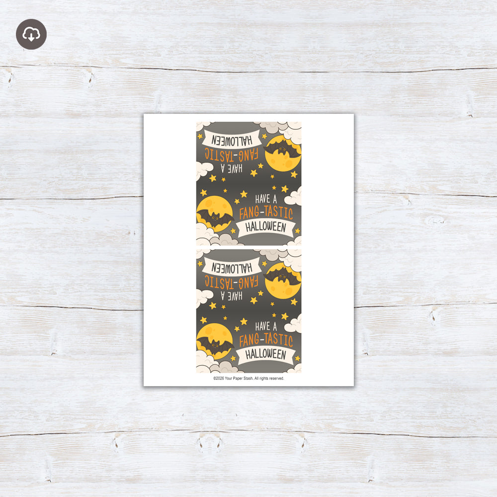Printable Halloween treat bag topper featuring a cute bat, moon, stars, and “Have a Fang-tastic Halloween” wording.