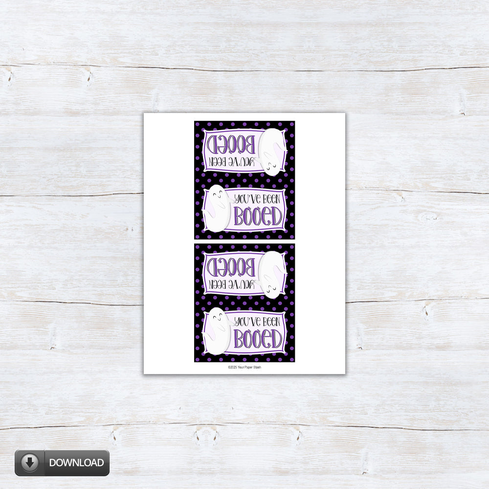 Printable Halloween bag topper with “You’ve Been Booed” wording, a smiling white ghost, and a black border covered in purple polka dots, available for 4" and 6.5" bags.