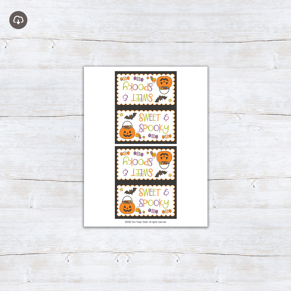 Sweet & Spooky printable Halloween bag topper with a jack-o’-lantern candy bucket, a bat, candy illustrations, colorful lettering, and a black border.