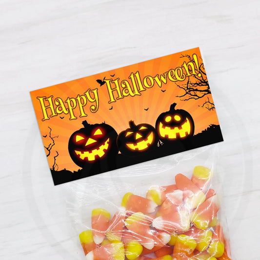 printable halloween treat bag toppers with happy and scary jack o'' lanterns