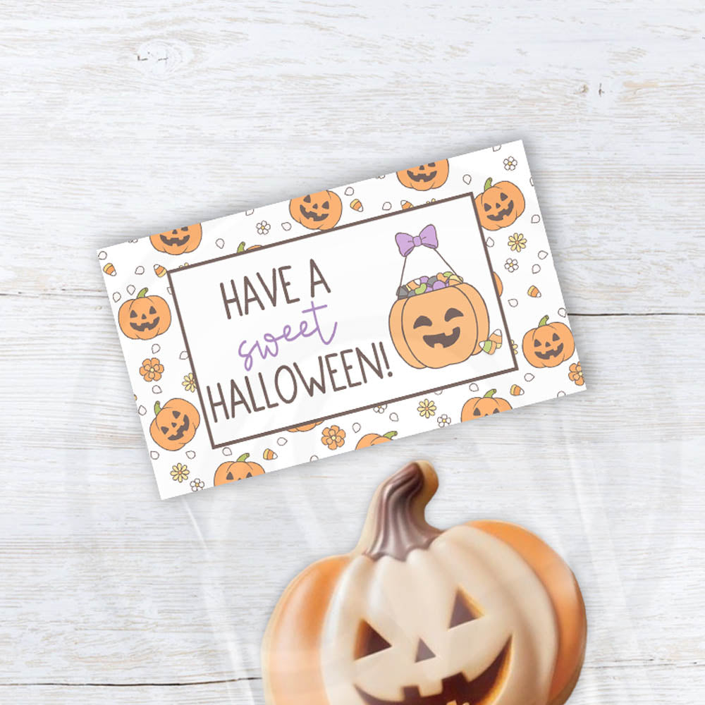 Cute pumpkin and candy corn Halloween printable treat bag toppers in two sizes.