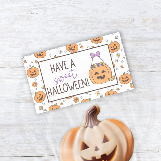 Cute pumpkin and candy corn Halloween printable treat bag toppers in two sizes.