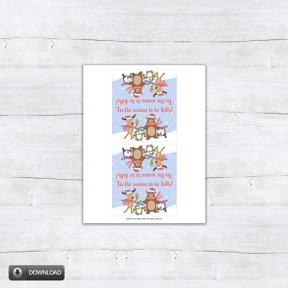 Printable “’Tis the Season to Be Jolly” holiday treat topper featuring reindeer, bear, penguin, and badger in scarves and Santa hats on a snowy blue background — perfect for folding over 4" and 6.5" holiday treat bags.