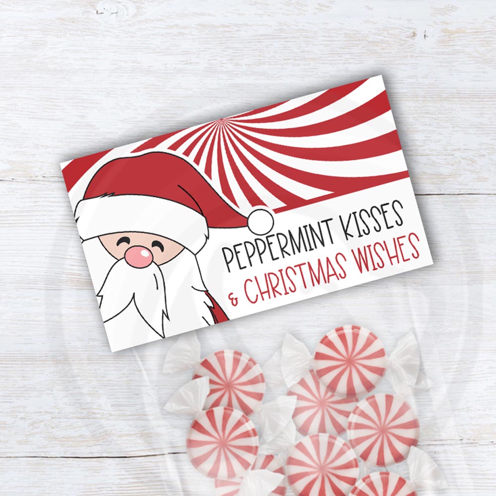 Santa-themed Christmas treat bag topper with red and white peppermint swirl design and the phrase “Peppermint Kisses & Christmas Wishes,” printable holiday favor topper.